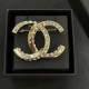 Chanel Half diamond CC brooch