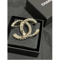 Chanel Half diamond CC brooch