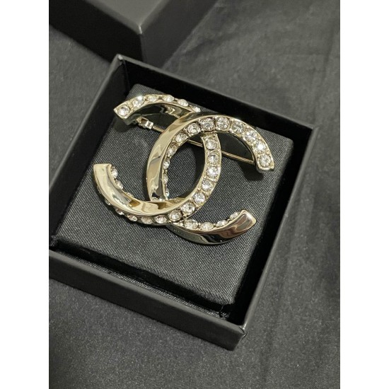 Chanel Half diamond CC brooch