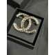 Chanel Half diamond CC brooch