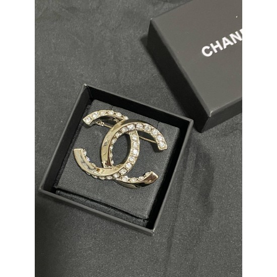 Chanel Half diamond CC brooch