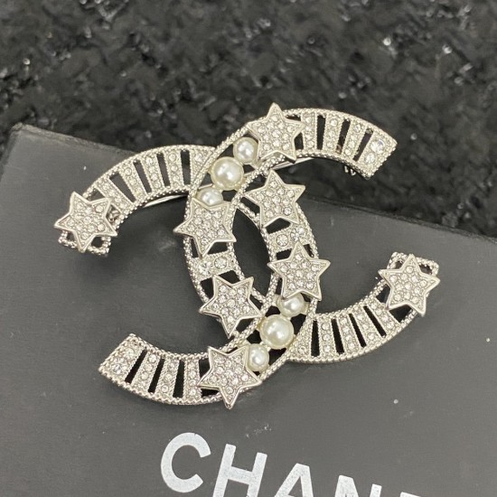 Chanel Classic pentagram with pearl and diamond studded double-C brooch