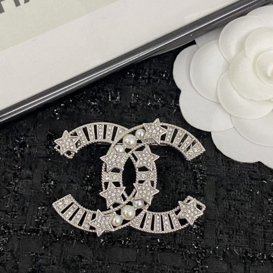 Chanel Classic pentagram with pearl and diamond studded double-C brooch