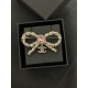 Chanel Pink diamond bow brooch