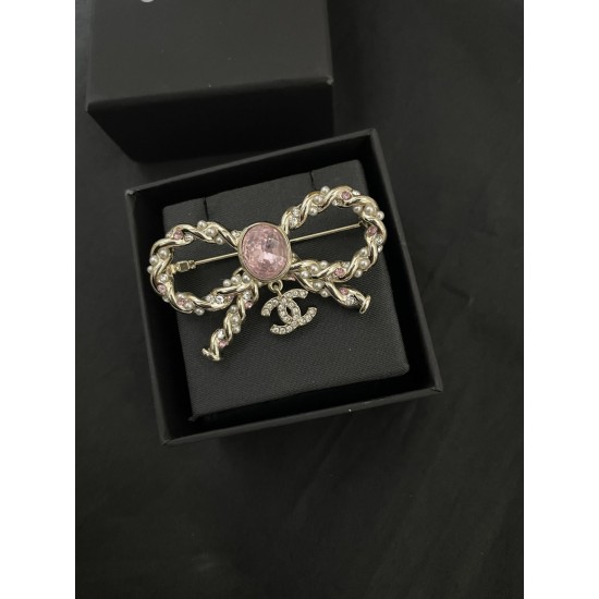 Chanel Pink diamond bow brooch