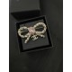 Chanel Pink diamond bow brooch