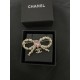 Chanel Pink diamond bow brooch