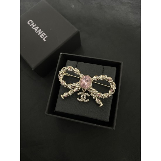 Chanel Pink diamond bow brooch