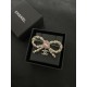 Chanel Pink diamond bow brooch